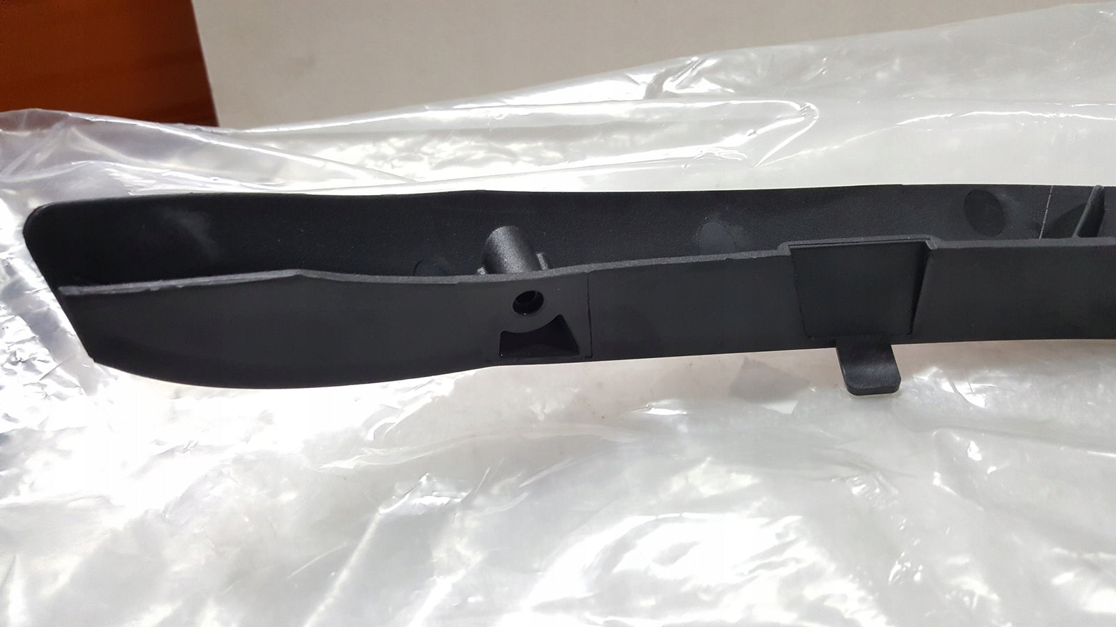 NOWY ORYGINALNY uchwyt nadkola lewy tył VW SKODA SEAT 12E810429