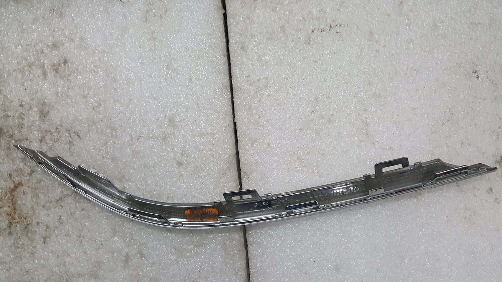 Listwa chrom zderzaka lewy tył VW GOLF VII kombi 5G9853331 demontaż