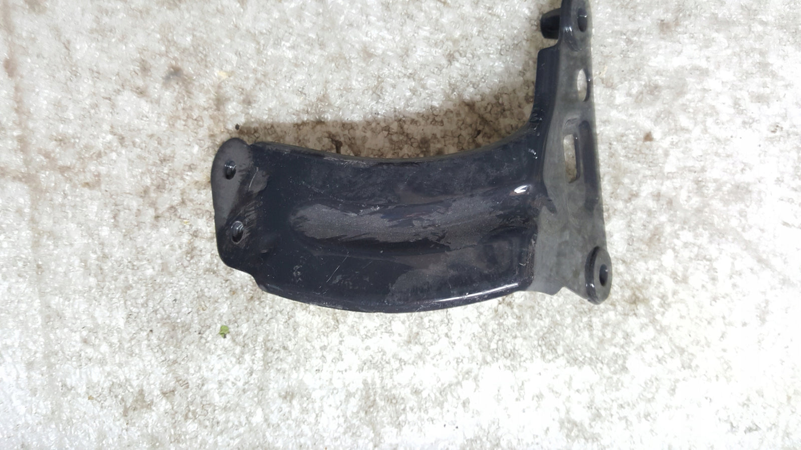 Wspornik błotnika lewy przód VW Golf VII 7 5G0821135C