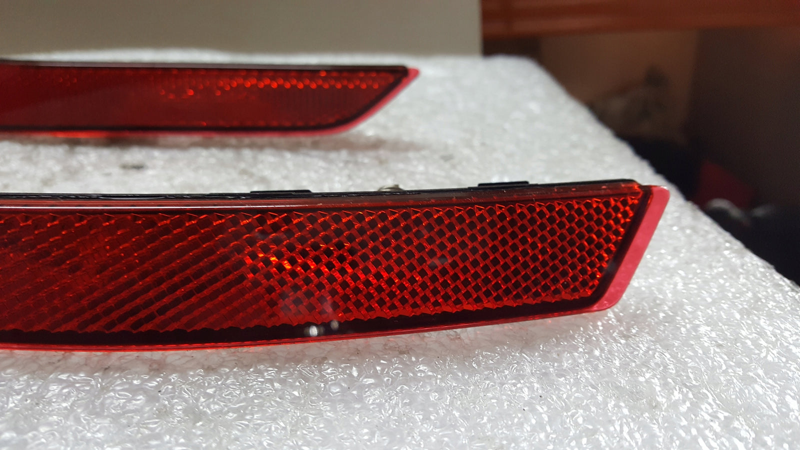Odblask zderzaka PR+LE tył AUDI A4 8W0945105C/106C