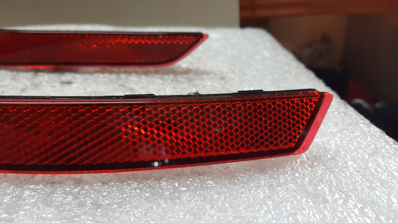 Odblask zderzaka PR+LE tył AUDI A4 8W0945105C/106C