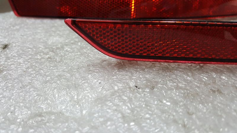 Odblask zderzaka PR+LE tył AUDI A4 8W0945105C/106C