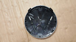 VW TOUAREG II LIFT VW UP LIFT ZNACZEK LOGO W ATRAPĘ 7P6853601D