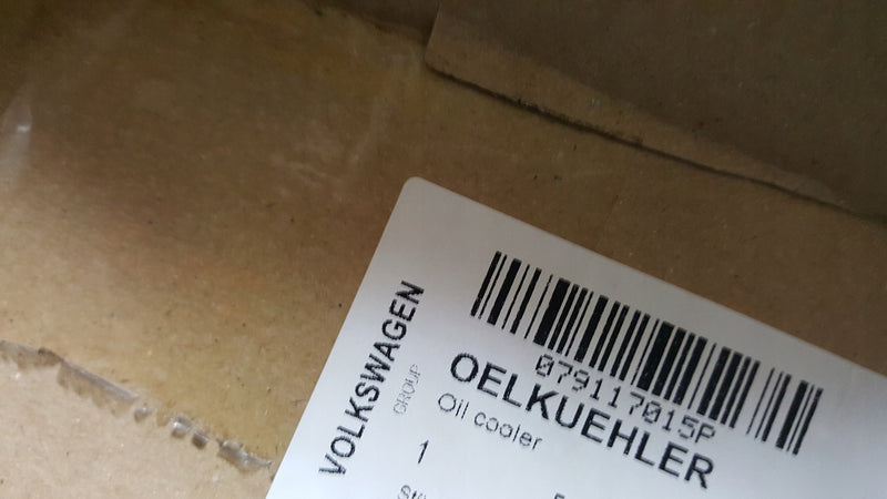 NOWA ORYGINALNA chłodnica oleju VW TOUAREG AUDI RS4 RS5 4.2 FSI 079117015P