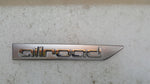 Emblemat ALLROAD na błotnik prawy przód AUDI A4 (B9) ALLLROAD 8W9853602