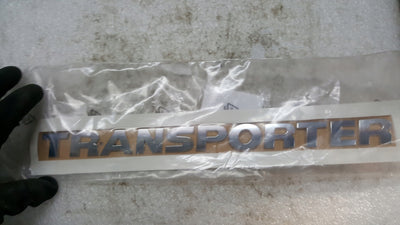 Emblemat napis VW T5 T6 7E0853687 NOWY ORYGINAŁ