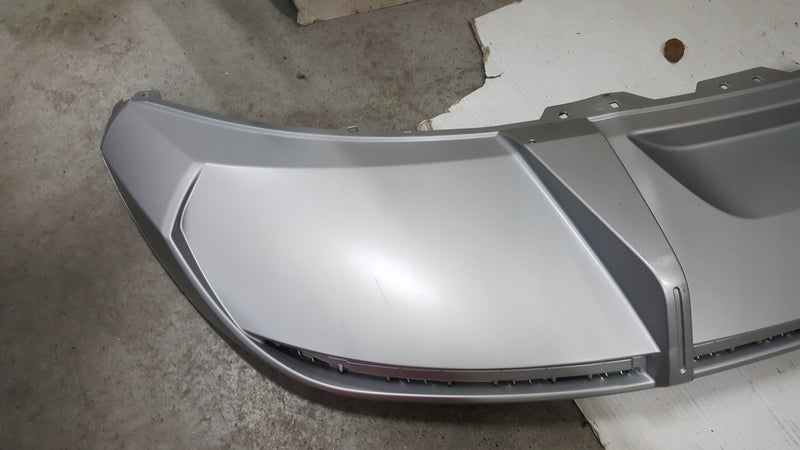 Dokładka spoiler dyfuzor zderzaka tylnego AUDI E-TRON 4KE807835C demontaż
