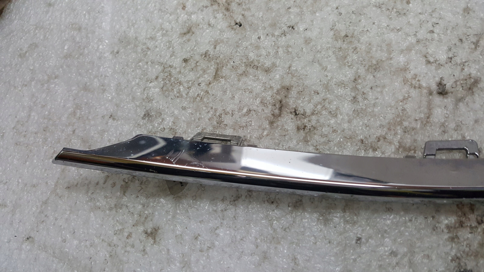 Listwa chrom zderzaka lewy tył VW GOLF VII kombi 5G9853331 demontaż