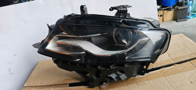 8K0941003G IDEAŁ! Le xenon skrętny Audi A4 B8 2008r z platformą mocującą