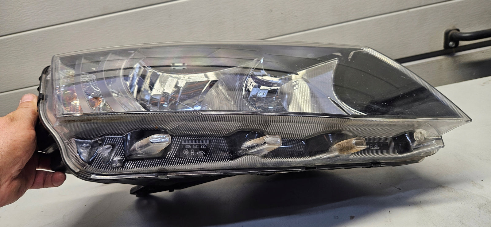 Pr reflektor SKODA Octavia III 5E1941016 oryginał