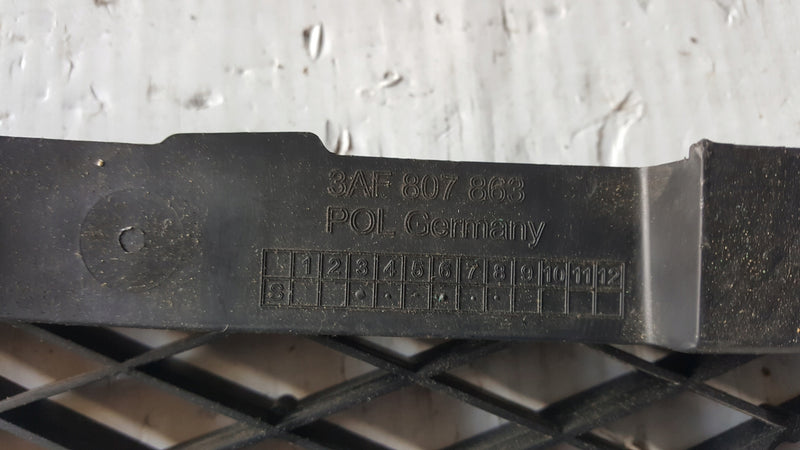 Wspornik ślizg zderzaka tył VW PASSAT B7 3AF807863 demontaż