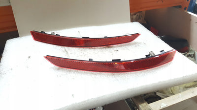 Odblask zderzaka PR+LE tył AUDI A4 8W0945105C/106C