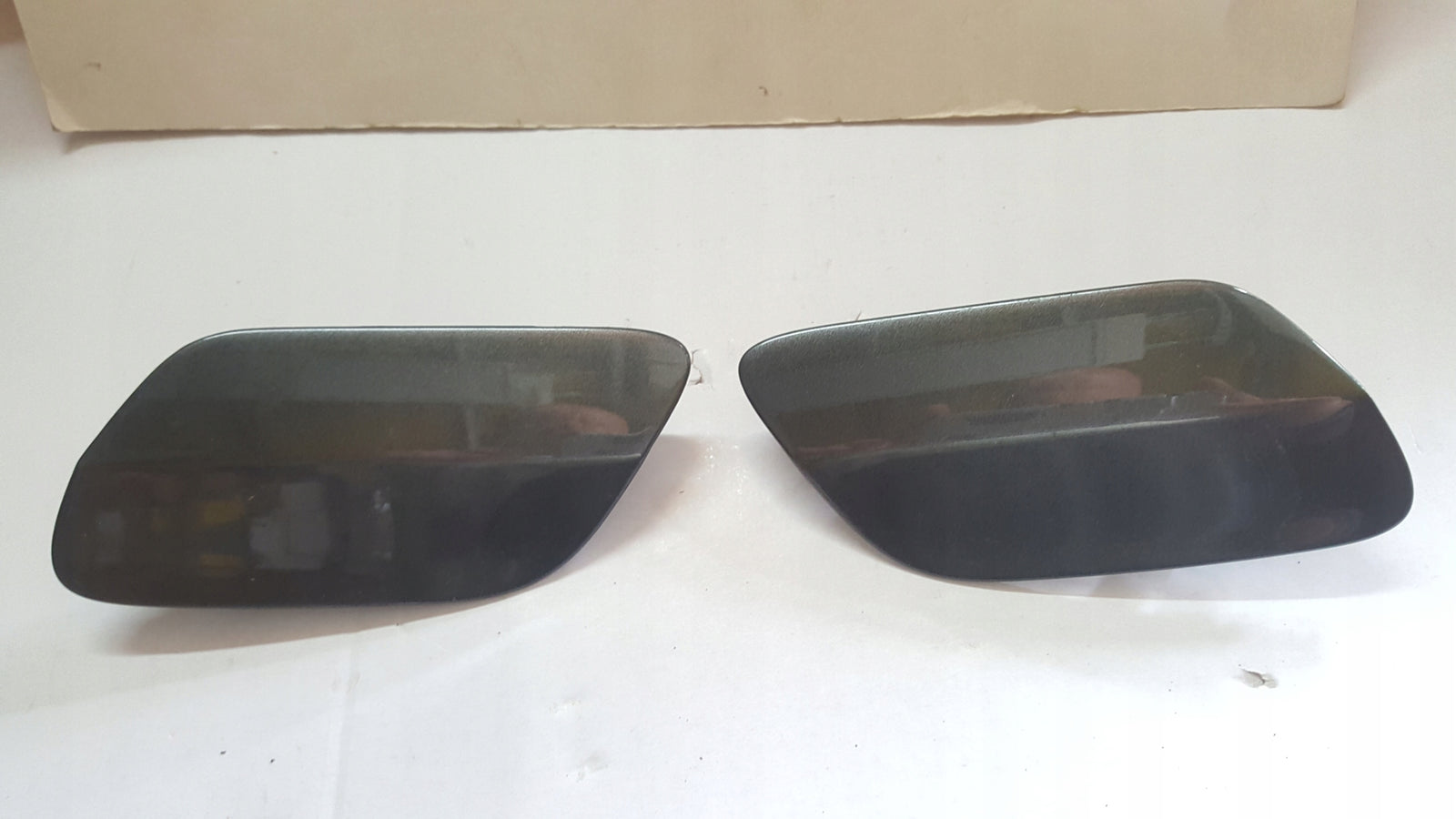 Zaślepki spryskiwaczy lewy + prawy przód AUDI Q7 4M0807753E 4M0807754E