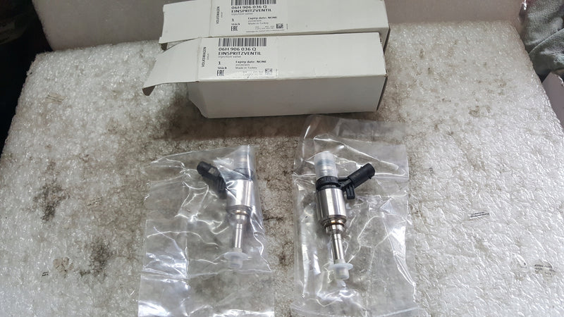 Wtryskiwacz VW AUDI SEAT SKODA 06H906036Q oryginał