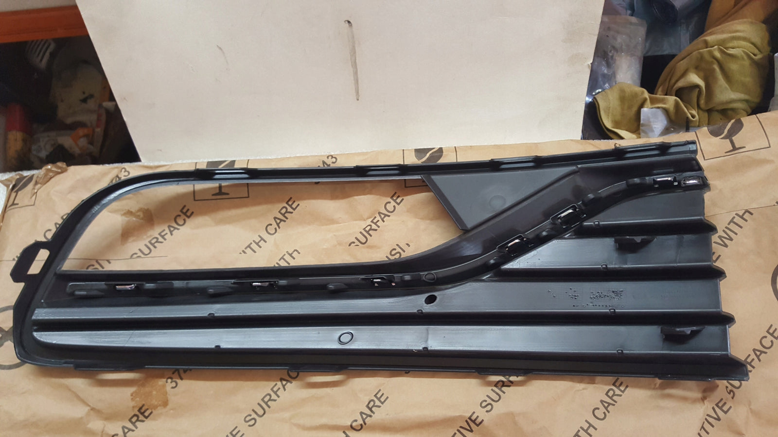 NOWA ORYGINALNA kratka zderzaka lewy przód VW POLO 6C0853665K